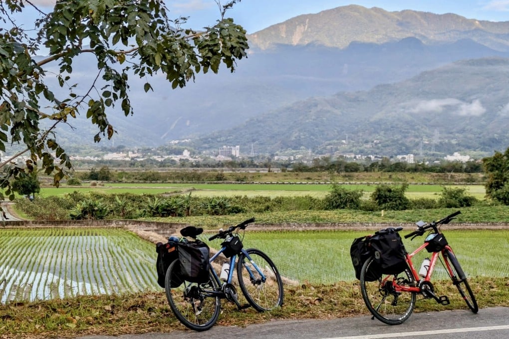 Bicycles parked with the Alishan mountains in the distance, during a ride around Taiwan. Cyclists on the island can take in stunning views but may have to brave nerve-racking traffic and bad weather. Photo: Cameron Dueck