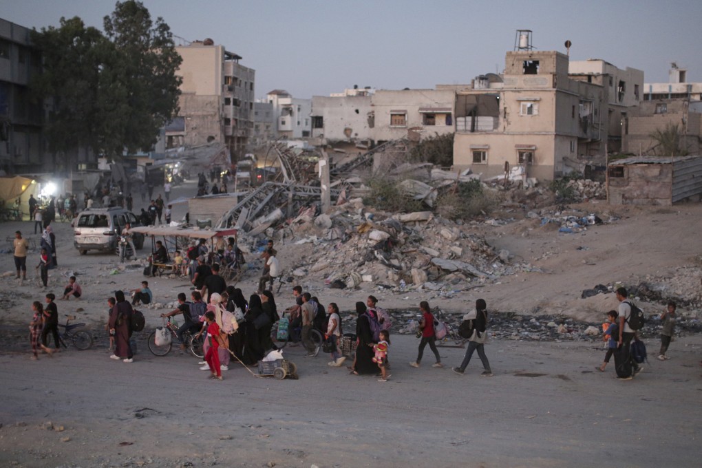 Palestinians flee from parts of Khan Younis following an evacuation order by the Israeli army on Monday. Photo: AP