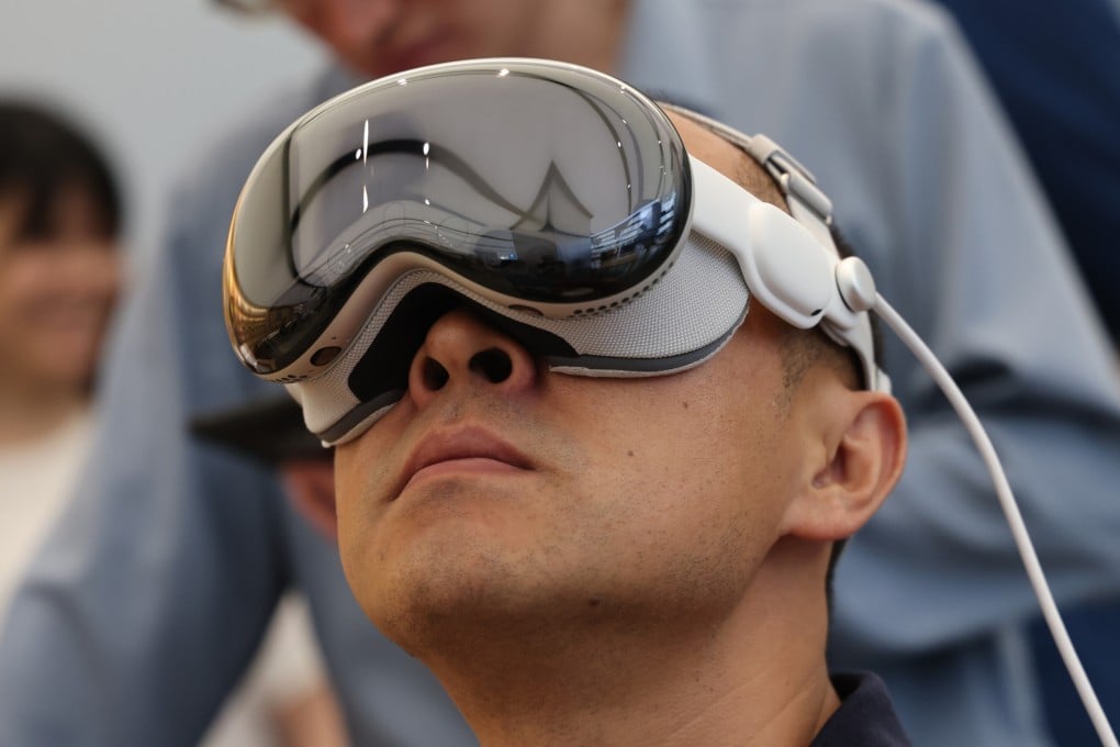 A customer tries the Apple Vision Pro at a store in Tsim Sha Tsui, Hong Kong. A Gen Z gamer and a gadget geek give their takes on the headset as it goes on sale in Asia, including in mainland China, Hong Kong, Japan and Singapore. Photo: Jelly Tse
