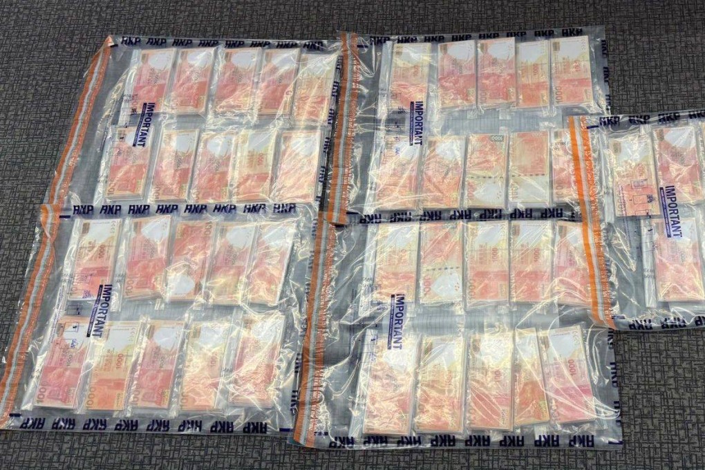 Some of the fake HK$1,000 notes taken out of circulation by a police sting operation in Tsim Sha Tsui on Tuesday. Photo: Handout