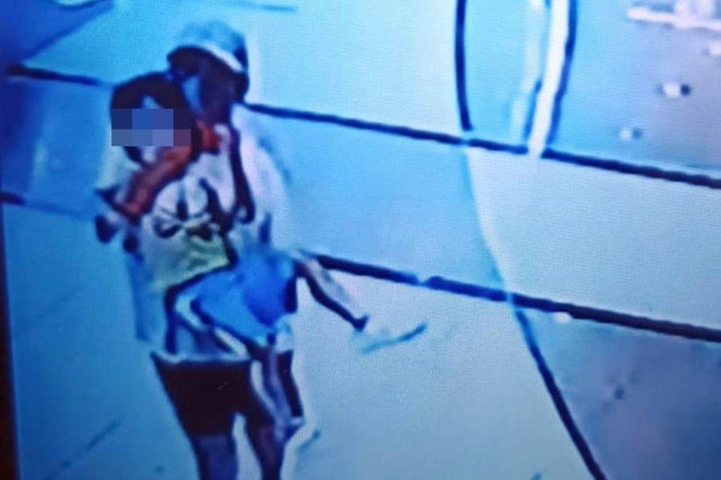 A CCTV image of a three-year-old boy being snatched from a Hong Kong shopping centre. Photo: FACEBOOK/ Vanessa Chan
