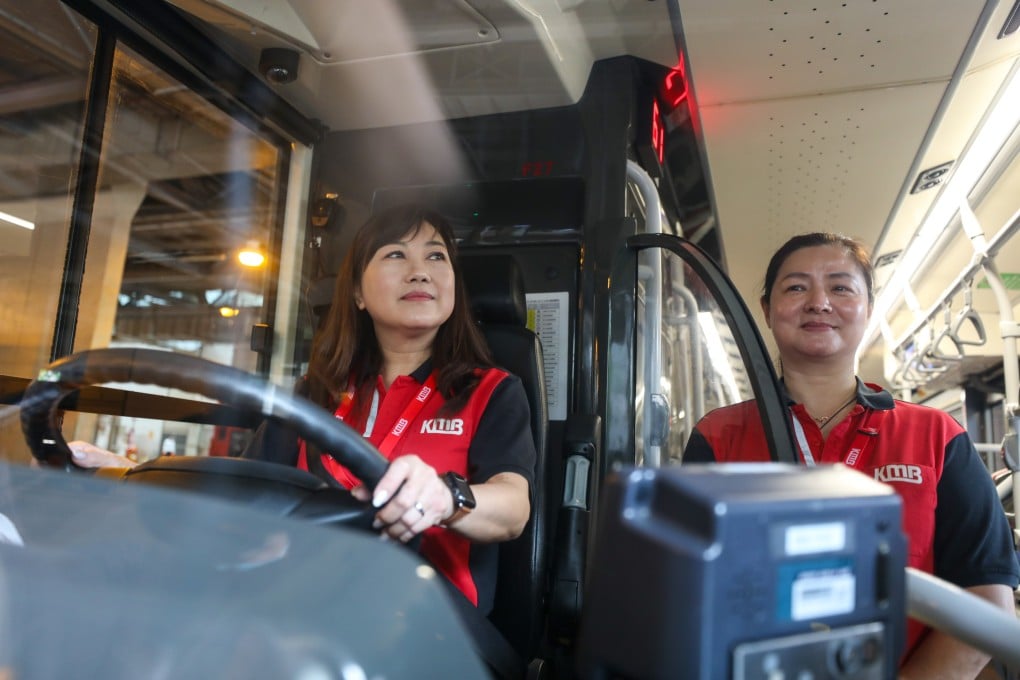 KMB bus drivers Janet Choi (left) and Cheung Yu at Tin Shui Wai Town Center Bus Terminal. Photo: Xiaomei Chen