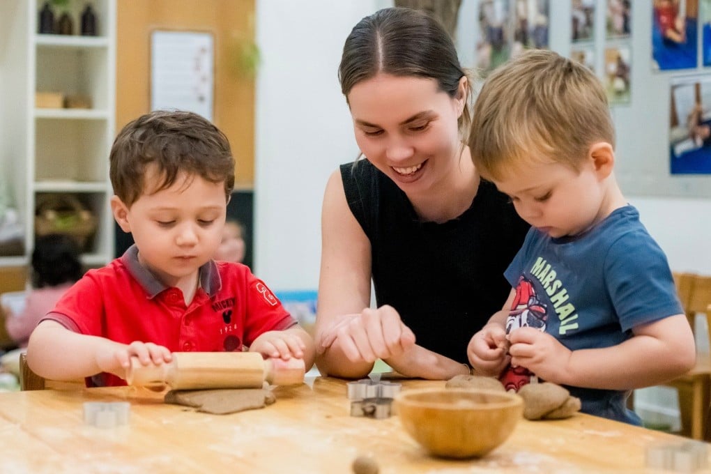 Cleona Cloete, principal of Wilderness International Kindergarten, with her young pupils. Photos: Handout