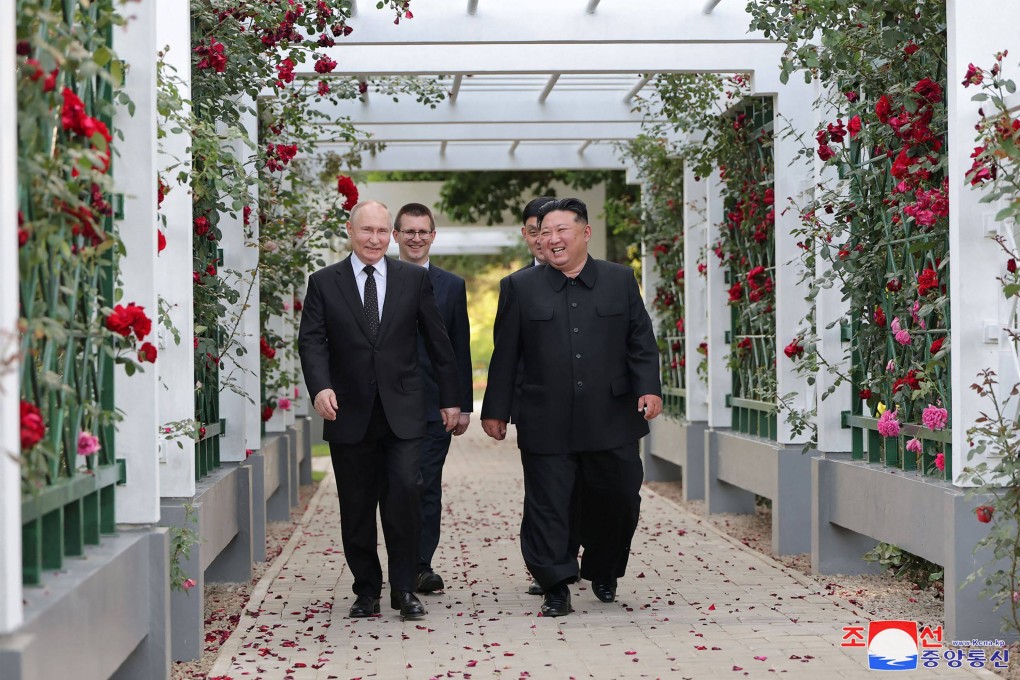 North Korean leader Kim Jong-un and Russian President Vladimir Putin take a stroll in the garden of the Kumsusan guesthouse in Pyongyang on June 19. Photo: Korean Central News Agency via KNS/AFP