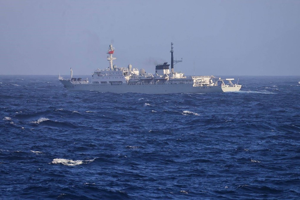 A Chinese navy ship sails through Japan’s territorial waters in the East China Sea. Photo: AFP