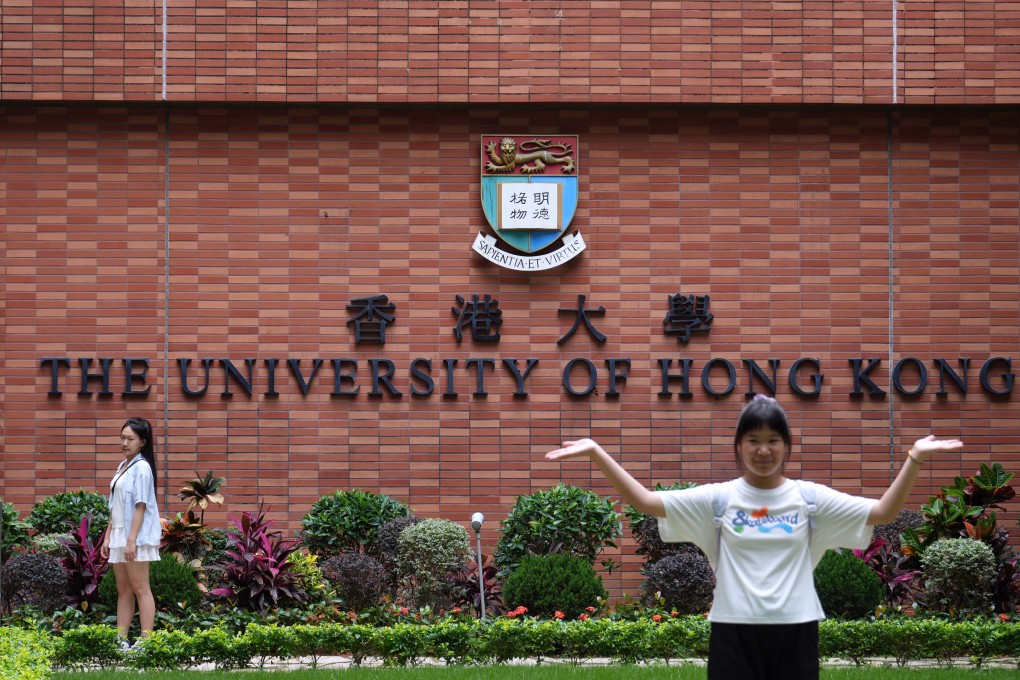 A red brick wall emblazoned with the university’s name and crest is one of the most popular spots for tourists visiting the Pok Fu Lam campus. Photo: Sam Tsang
