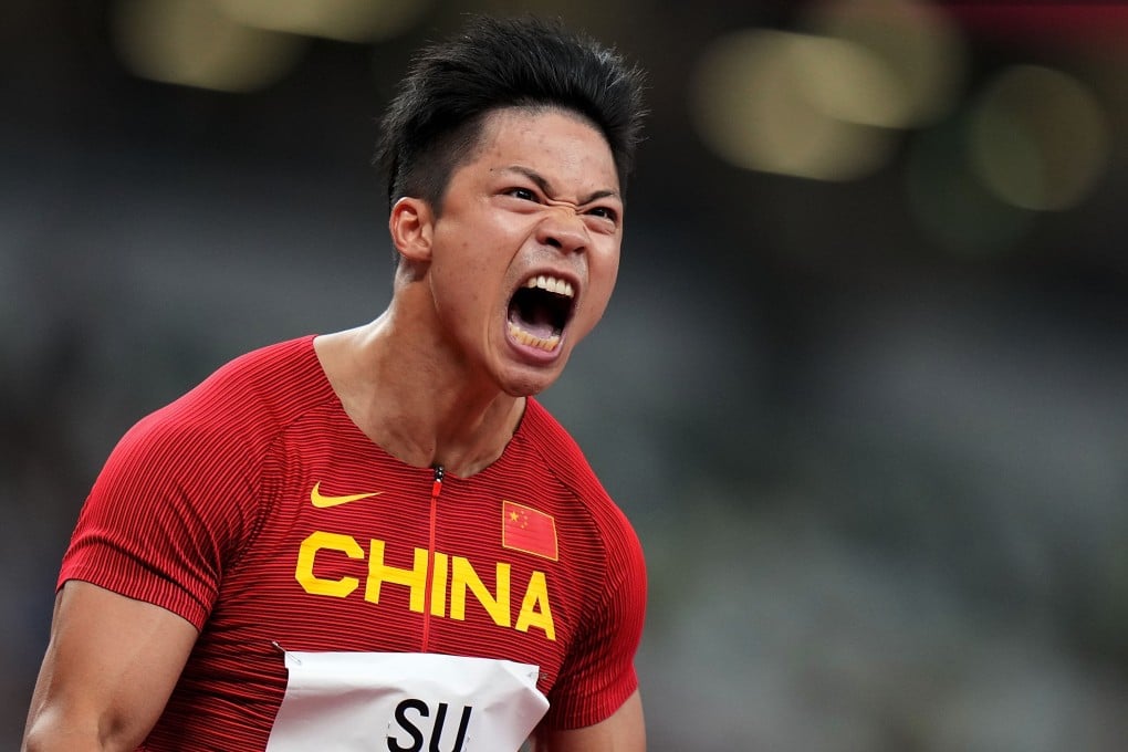 Su Bingtian is ecstatic after setting an Asian record in his 100m semi-final in Tokyo. Photo: Xinhua
