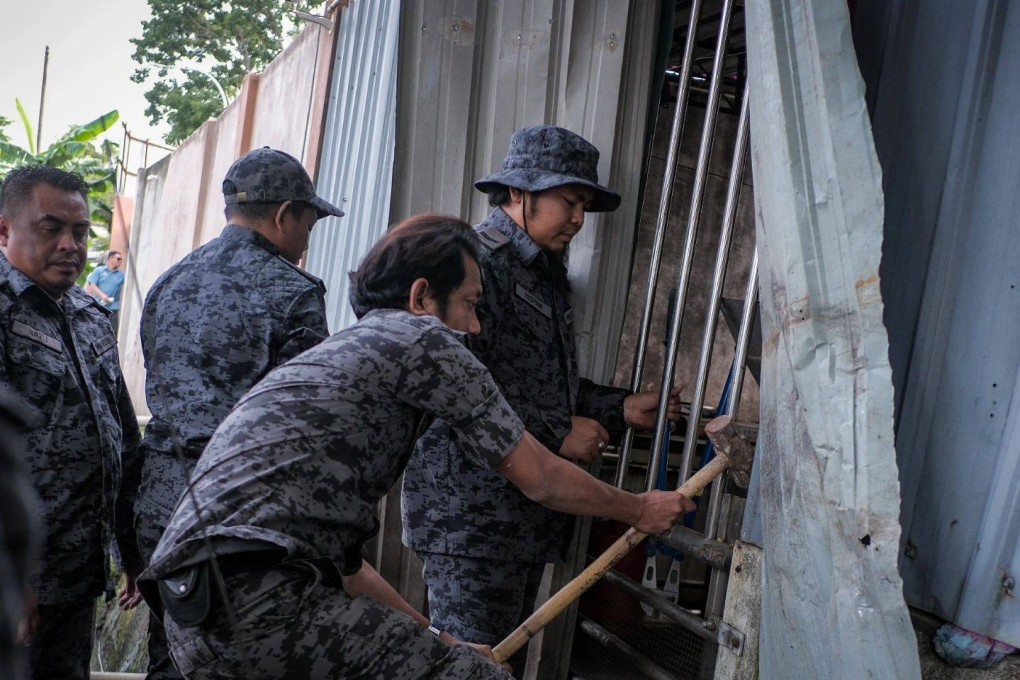 Royal Malaysian Police raiding illegal waste processing factories in Kedah state. Photo: Ministry of Natural Resources and Environmental Sustainability
