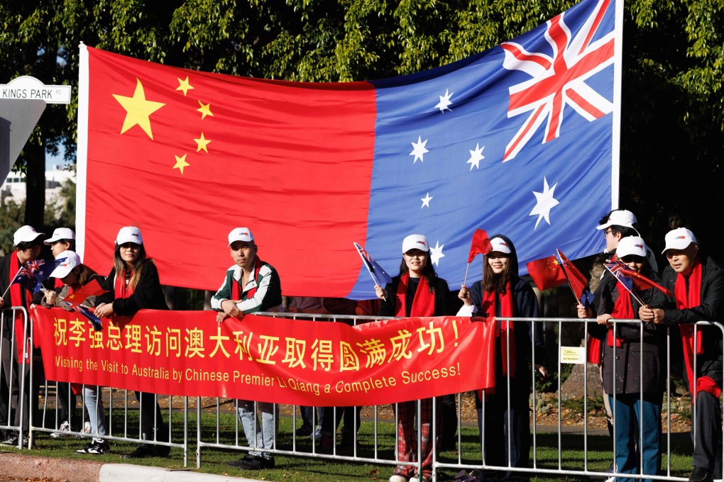 Members of the Australian-Chinese community await the arrival of China’s Premier Li Qiang and Australian Prime Minister Anthony Albanese in Perth last month. Photo: AFP