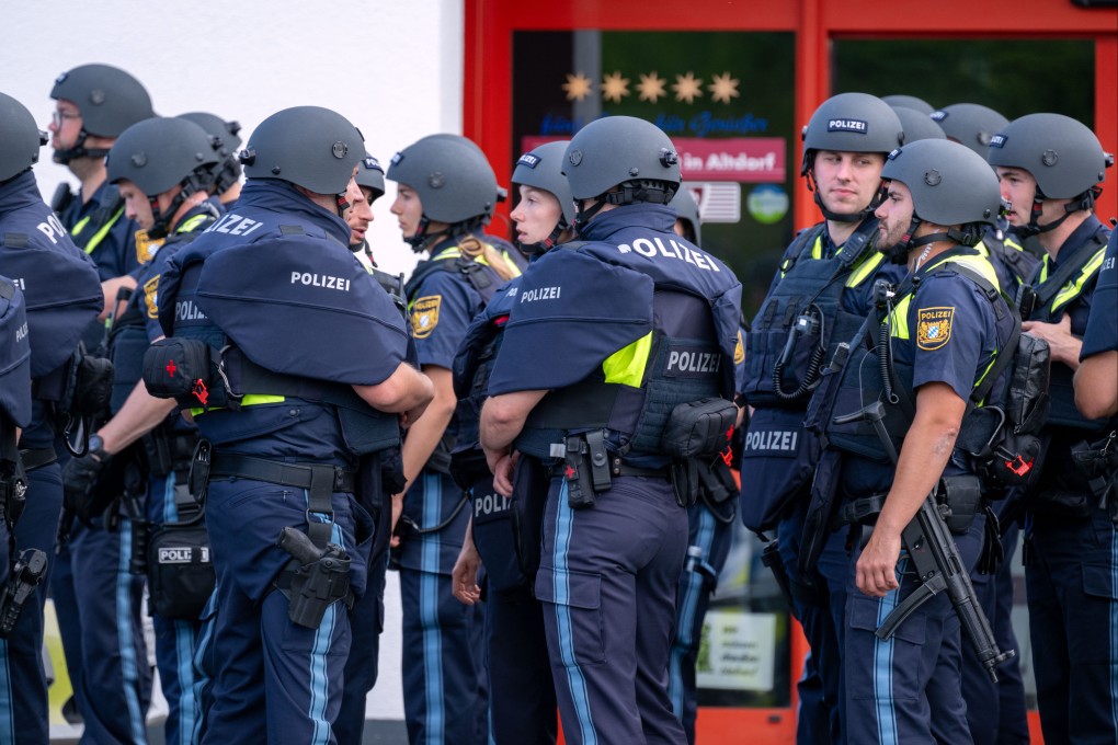 Police near the scene in Altdorf, near Nuremberg, Germany. Photo: dpa