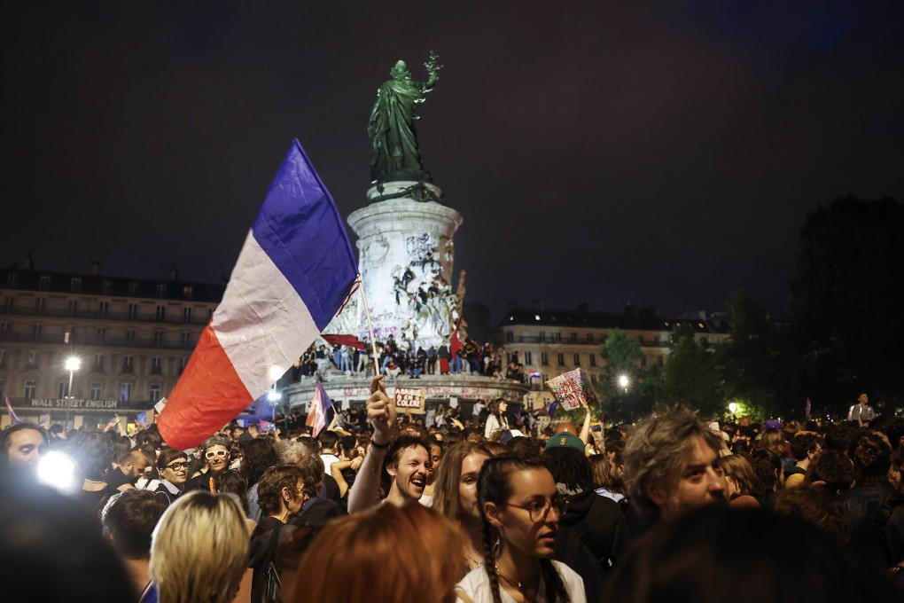 Scenes in Paris on Sunday after the second-round vote. Photo: EPA-EFE