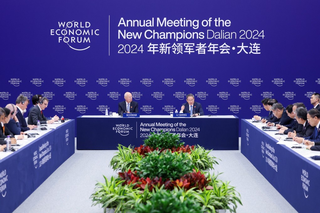 Chinese Premier Li Qiang attends a symposium for foreign business representatives at the 15th Annual Meeting of the New Champions in Dalian. Photo: Xinhua