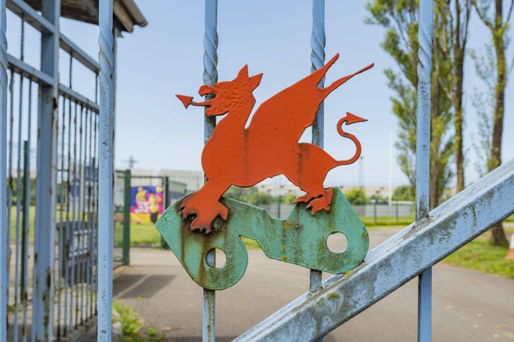 The Welsh dragon on the gates of the Tata Steel sports and social club in Port Talbot, Wales, UK. Photo: Bloomberg