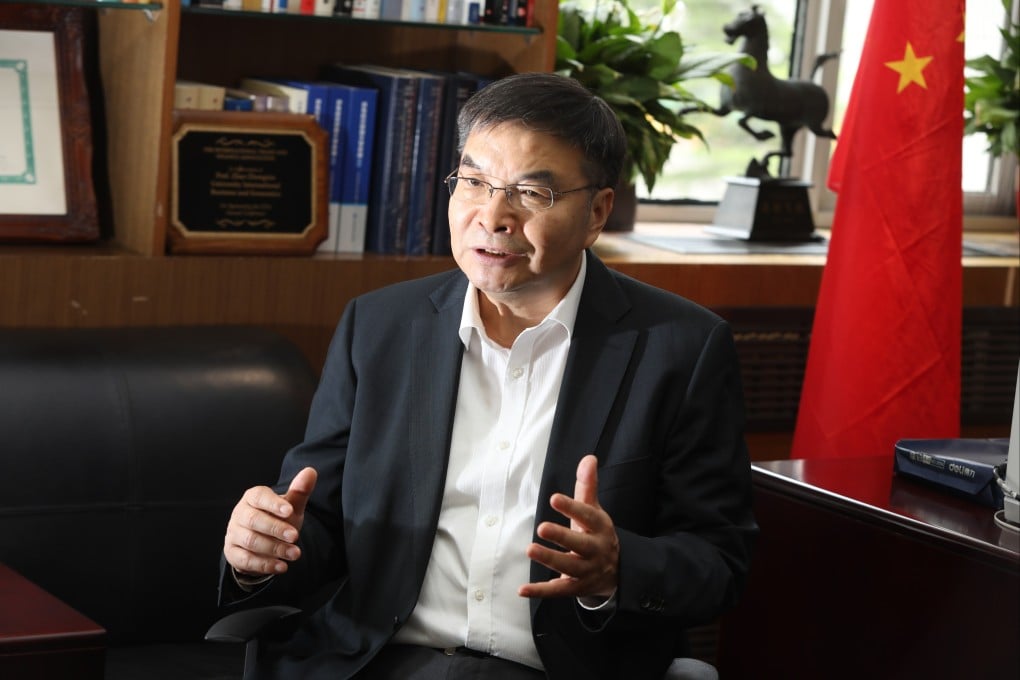 Zhao Zhongxiu, president of the University of International Business and Economics in Beijing, said the market can be relied upon to resolve China’s excess capacity in green energy. Photo: Simon Song