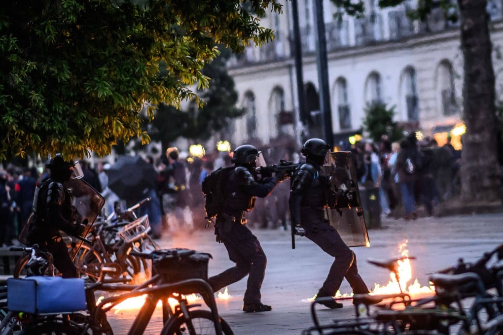 Riot police in Nantes, western France on Sunday. Photo: AFP