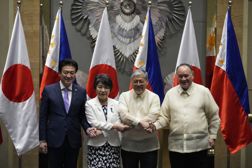 Japanese Defence Minister Minoru Kihara and Foreign Minister Yoko Kamikawa pictured with their Philippine counterparts Enrique Manalo and Gilberto Teodoro after the signing of the deal. Photo: AP