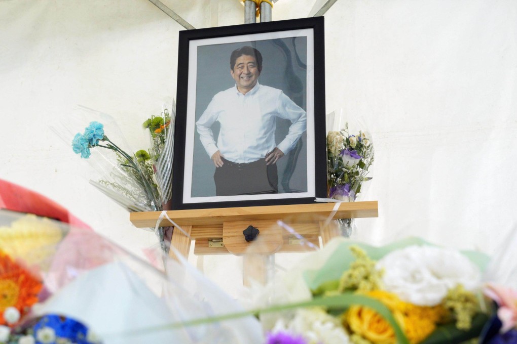 Photo of former Japanese Prime  Minister Shinzo Abe is seen placed on a podium on the second anniversary of his assassination in the western Japan city of Nara. Photo: Kyodo