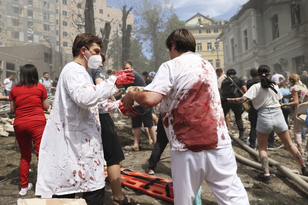 Rescuers, medical staff and volunteers clean up the rubble and search for victims after a Russian attack on the country’s main children’s hospital, Okhmadit, in Kyiv, Ukraine on Monday. Photo: AP