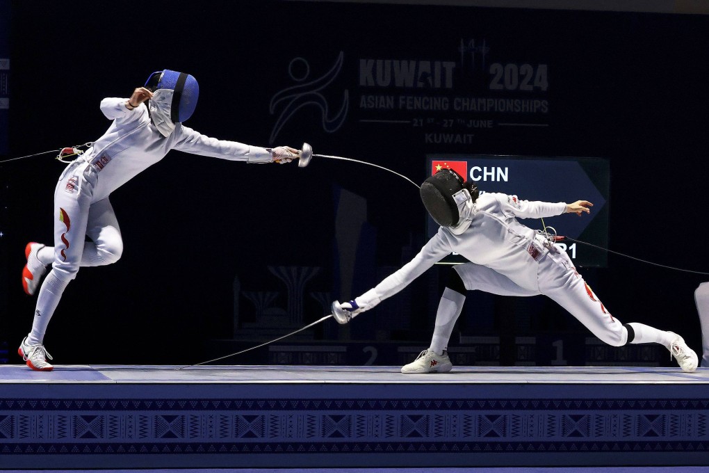 China’s Sun Yiwen (left), competing against compatriot Yu Sihan at the Asian championships in Kuwait in June, is the women’s epee defending champion. Photo: AFP