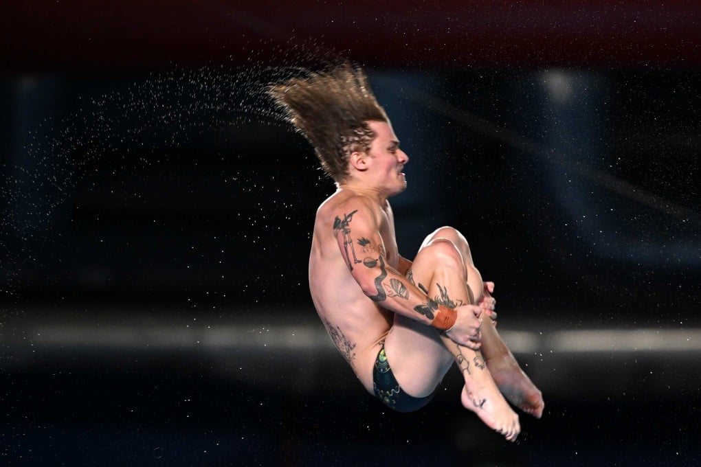 Australia’s Cassiel Rousseau competes in the final of the mixed team diving event at the 2024 World Aquatics Championships. Photo: AFP