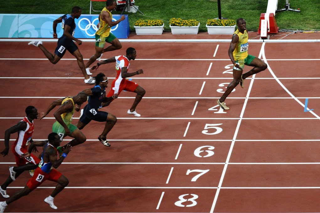 Jamaica’s Usain Bolt crosses the 100 metres finish line well clear of his rivals at the 2008 Beijing Olympics. Photo: AFP