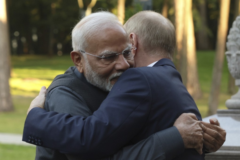 Indian Prime Minister Narendra Modi  and Russian President Vladimir Putin embrace during an informal meeting outside Moscow on Monday. Despite outward displays of affection, tensions persist between the leaders of India, Russia and China. Photo: AP