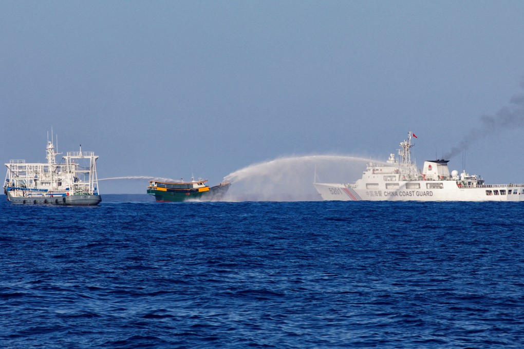 Chinese coastguard ships fire water cannons towards a Philippine resupply vessel on a resupply mission to Second Thomas Shoal in the South China Sea in March. Photo: Reuters