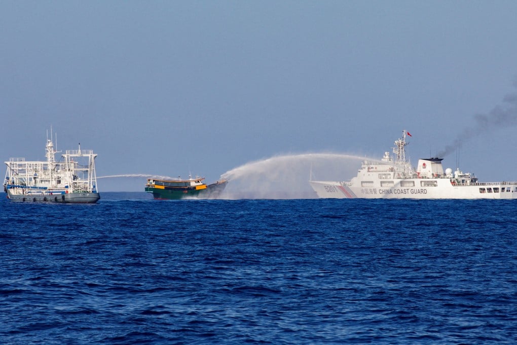 Chinese coastguard ships fire water cannons towards a Philippine resupply vessel on a resupply mission to Second Thomas Shoal in the South China Sea in March. Photo: Reuters