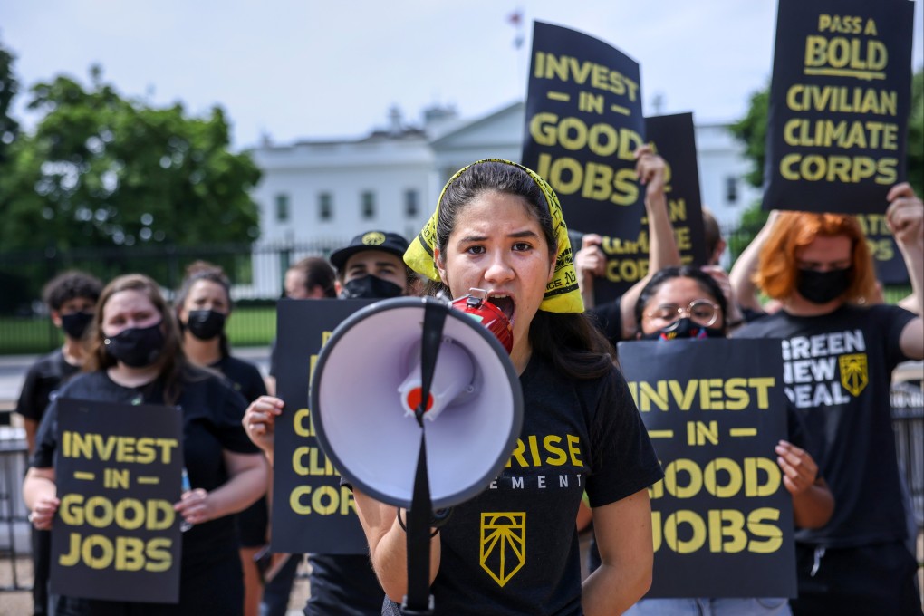 Protesters from the Sunrise Movement demonstrate outside the White House demanding action on climate change and green jobs, in Washington, US, on June 4, 2021. Photo: Reuters