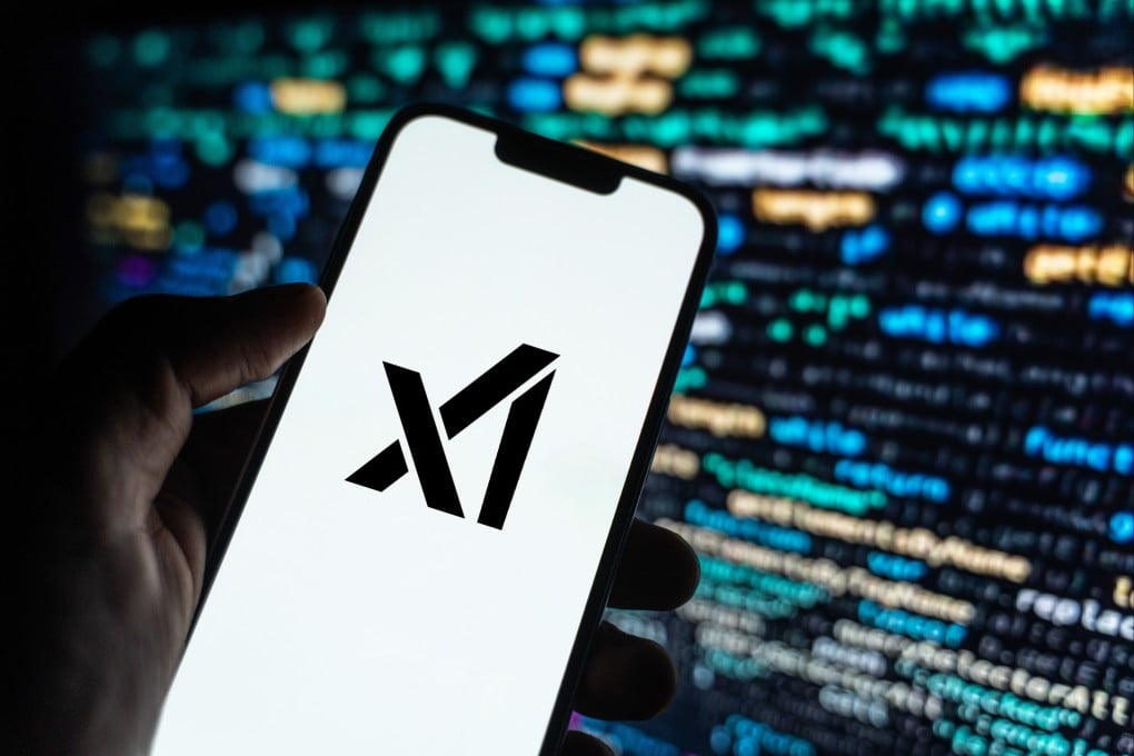 The xAI logo is seen on a smartphone screen in this arranged photograph. Photo: Shutterstock Images