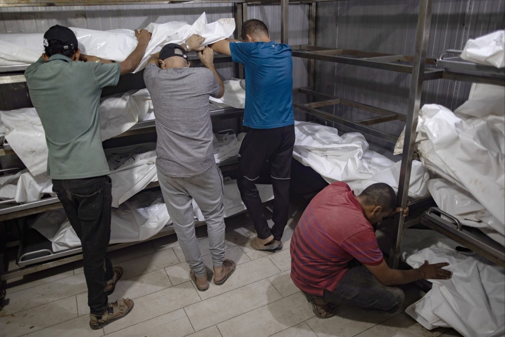 Scenes in a morgue at Nasser Hospital in Khan Younis following an Israeli bombing that targeted a Gaza school. Photo: EPA-EFE