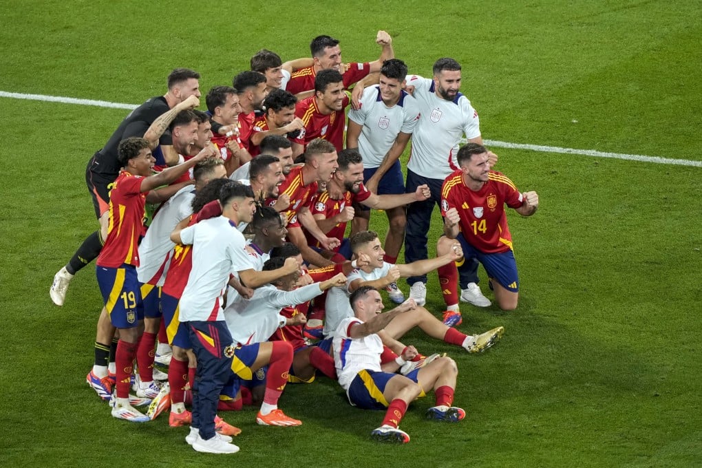 Spain’s players celebrate after their victory over France in the Euro 2024 semi-finals. Photo: AP