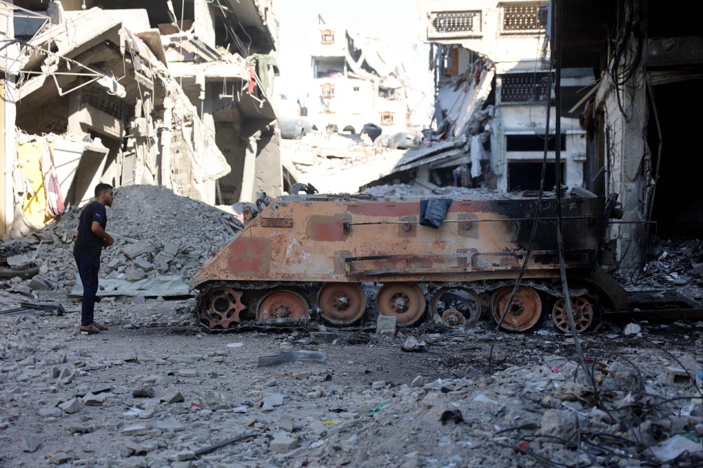 A destroyed Israeli military vehicle in a neighbourhood east of Gaza City. Photo: AFP