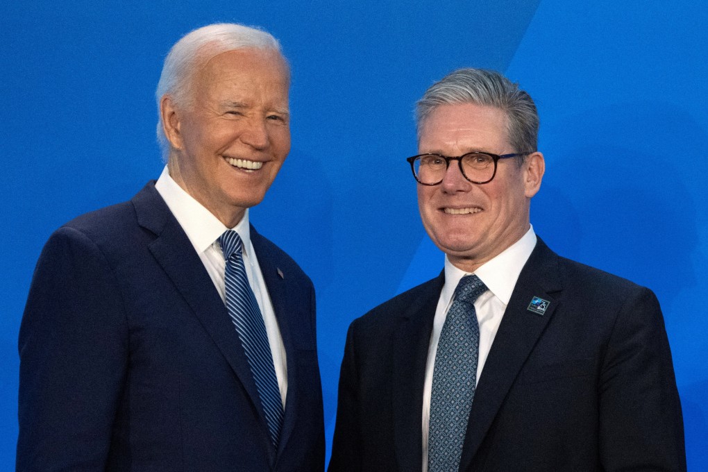 US President Joe Biden (left) greets UK Prime Minister Keir Starmer, as he arrives for a welcome ceremony at the Nato summit in Washington on Wednesday. Photo: Reuters
