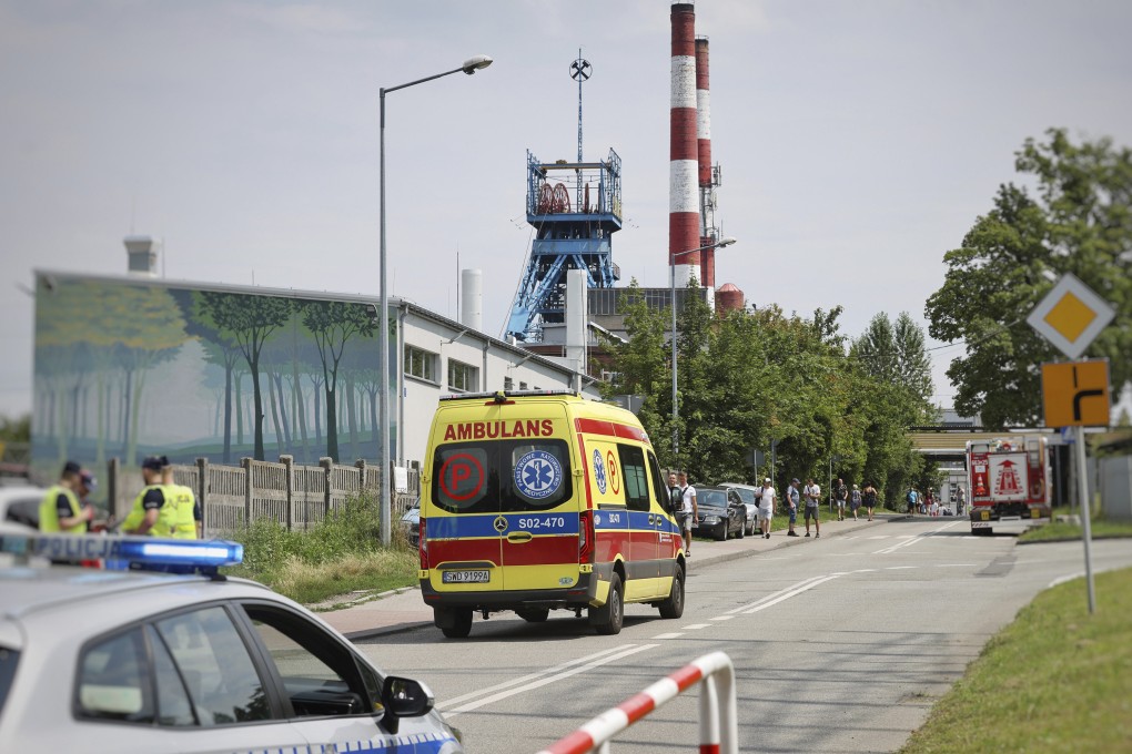 An ambulance heads into the Rydultowy coal mine near the city of Rybnik, in southern Poland. Photo: AP