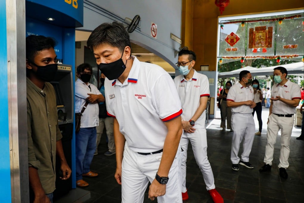 Ng Chee Meng of the People’s Action Party and current NTUC Secretary-General with party members at a walkabout ahead of the 2020 general election. Photo: Reuters