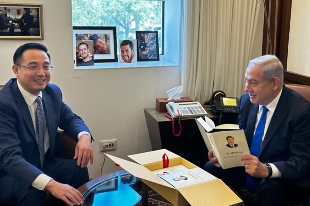 China has tapped Ambassador Cai Run, shown giving Israeli Prime Minister Benjamin Netanyahu an autographed copy of Chinese President Xi Jinping’s book, to bcome Beijing’s envoy to the EU. Photo: X/@IsraeliPM