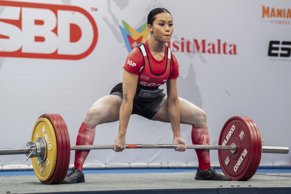 Singaporean powerlifter Farhanna Farid just before she broke a dead-lifting world record at the World Open Classic Powerlifting Championships earlier this year. The trained pharmacist talks about how the sport she accidentally fell into has made her strong mentally. Photo: SBD & White Lights Media