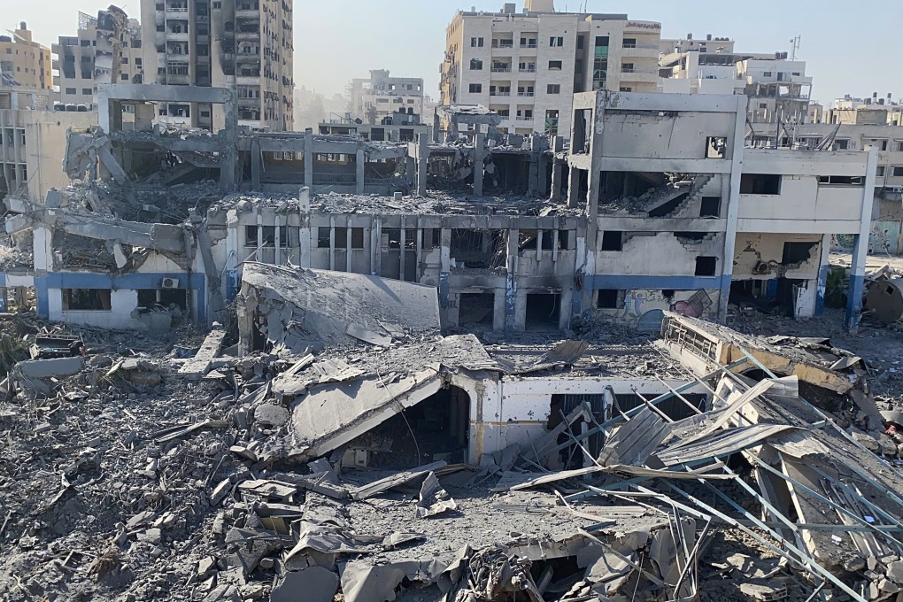 The damaged UN Relief and Works Agency for Palestine Refugees (UNRWA) building complex is seen in western Gaza City’s Al-Sinaa neighbouhood on Friday following the withdrawal of Israeli troops from the area. Photo: APA Images via ZUMA Press Wire/dpa