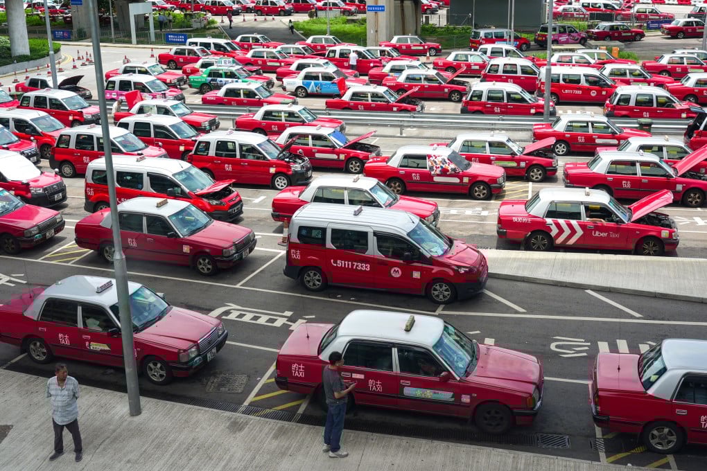 Taxis line up at the airport. One cabbie told the Post he doubted the increase would deter people from hiring him, saying the rise was minimal. Photo: Eugene Lee