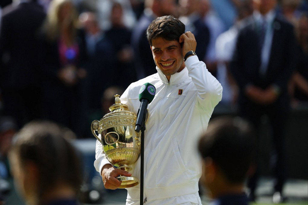 Spain’s Carlos Alcaraz with the Wimbledon trophy after winning the men’s singles final against Serbia’s Novak Djokovic in London on Sunday. Photo: Reuters