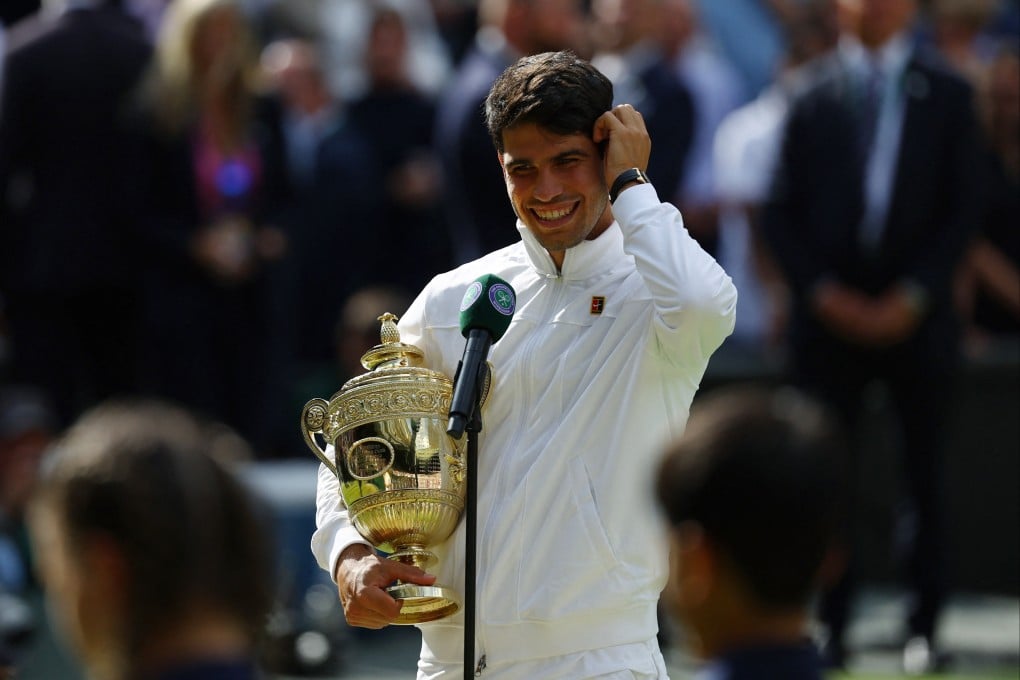 Spain’s Carlos Alcaraz with the Wimbledon trophy after winning the men’s singles final against Serbia’s Novak Djokovic in London on Sunday. Photo: Reuters