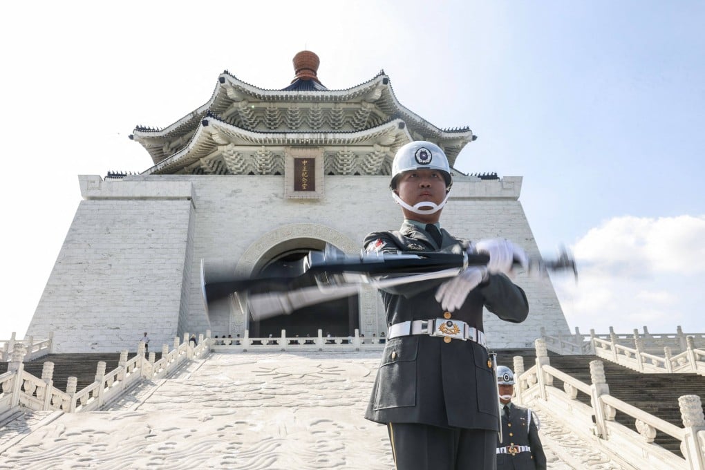 The changing of the guard ceremony has been moved outside the Chiang Kai-shek Memorial Hall in Taipei, after being staged around a statue of the late leader since 1980. Photo: AFP