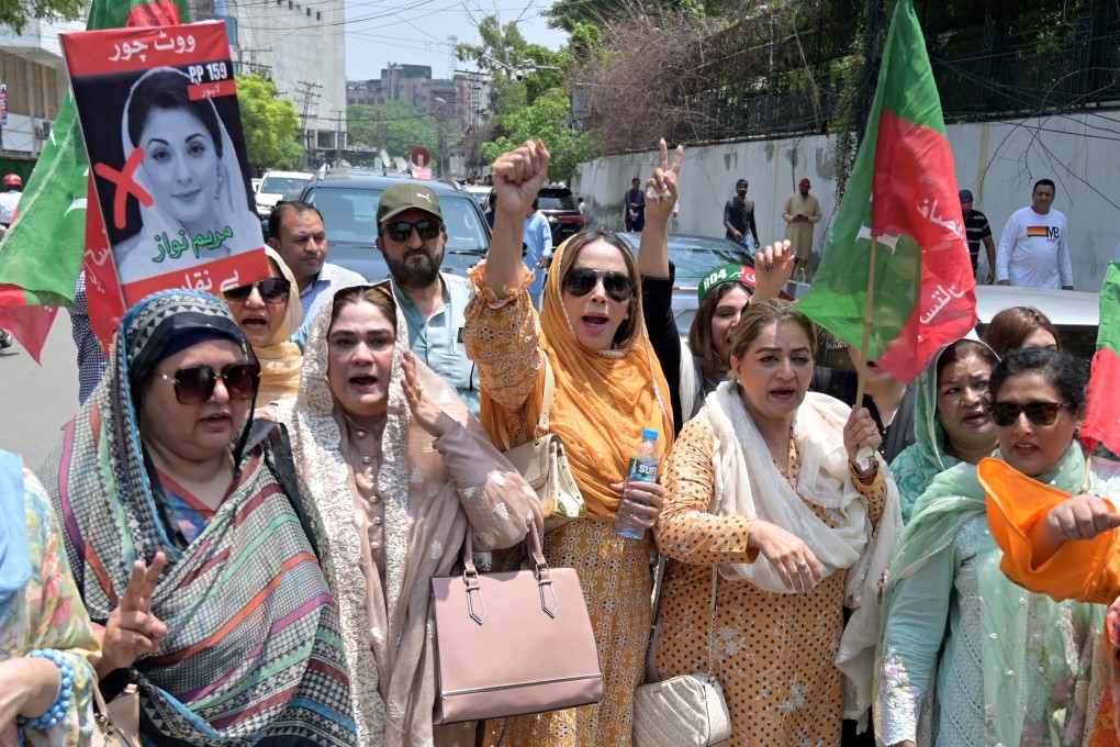 Supporters of former prime minister Imran Khan celebrate after a court overturned Khan’s conviction for illegal marriage that carried a seven-year sentence. Photo: EPA-EFE