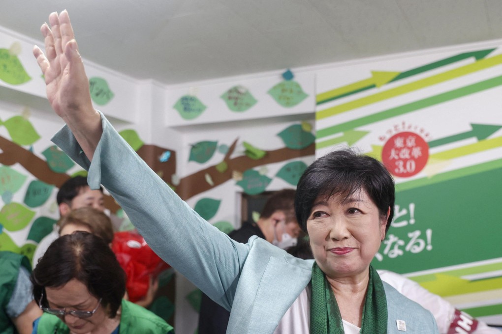 Tokyo governor Yuriko Koike waves to supporters right before her re-election victory on July 7. Photo: Reuters/Kyodo