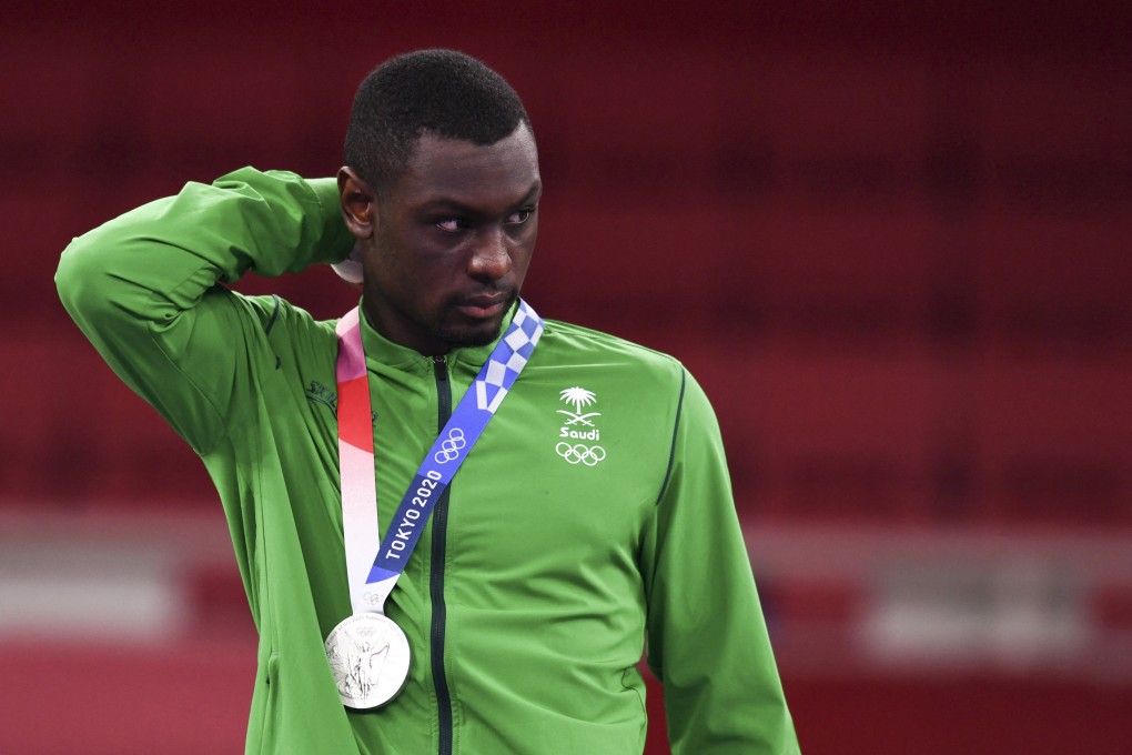 Saudi Arabia’s Tareg Hamedi won a silver medal in karate at the Tokyo Games, but was rewarded at home as though he had won a gold medal. Photo: Reuters