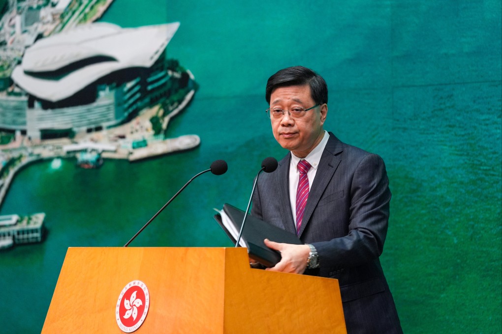 John Lee addresses the media before attending an Executive Council meeting on Tuesday morning. Photo: Eugene Lee