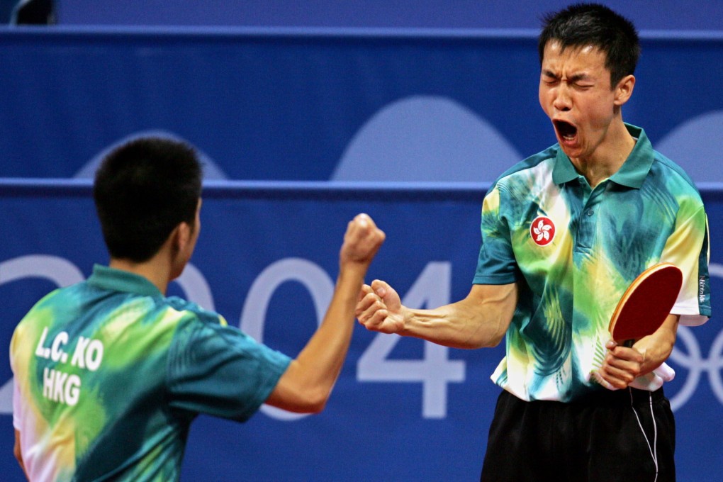Hong Kong’s Li Ching (right) celebrates with doubles partner Ko Lai-chak on their way to winning silver in Athens. Photo: AP