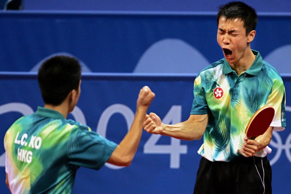 Hong Kong’s Li Ching (right) celebrates with doubles partner Ko Lai-chak on their way to winning silver in Athens. Photo: AP