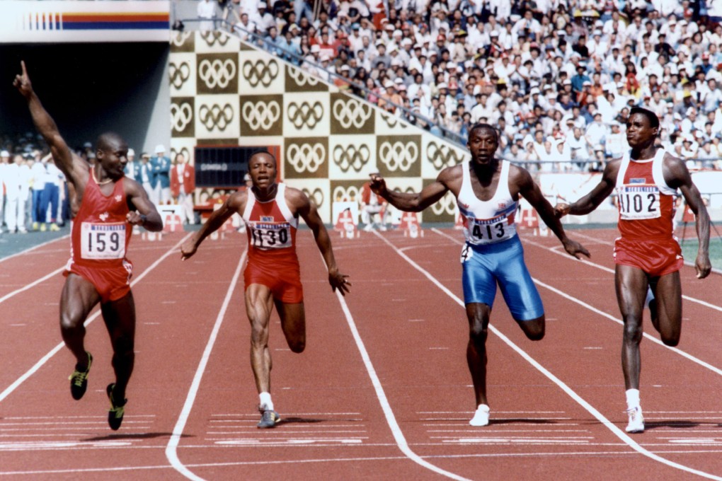 Canadian sprinter Ben Johnson (far left) signals victory in the 100m final with a world record of 9.79 seconds. Calvin Smith (US) in the next lane was fourth, with Linford Christie third, and Carl Lewis (far right) second. Photo: AFP